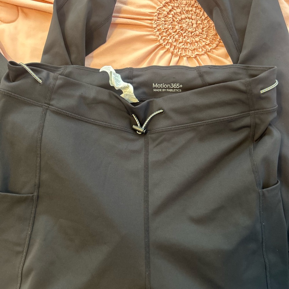Two pairs of Fabletics leggings